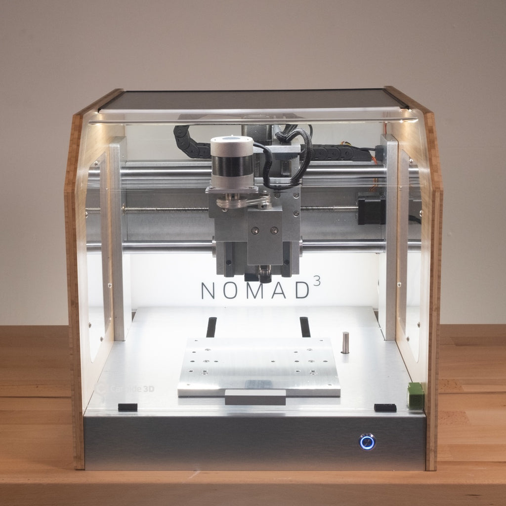 Figure 2 — The clear front door and internal work area. The whole cutting volume is contained. Source: Carbide 3D product photography.